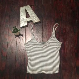 Green and white striped tank top